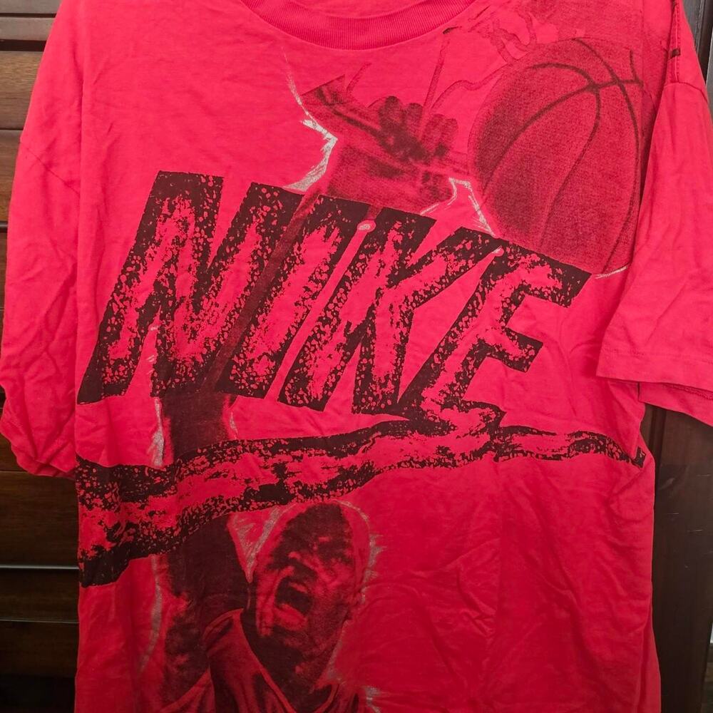 Vintage red nike tee featuring